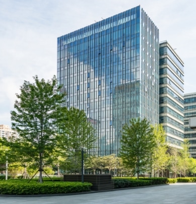 full shot of building and green surrounding